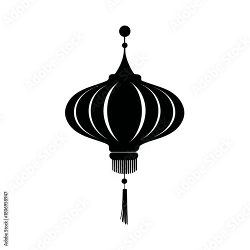 Black lantern with tassel hanging and beaded detail