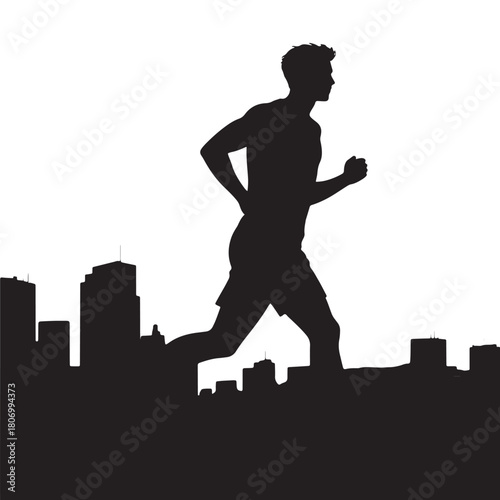Silhouette of a male runner in the city center at sunset