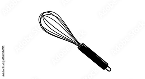 A black handled wire whisk for cooking and baking isolated on white background