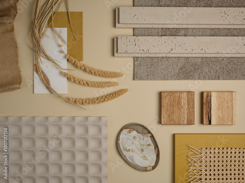 Neutral beige and ochre material palette with wood, stone, and fabric samples. A natural, organic mood board for interior design concepts.