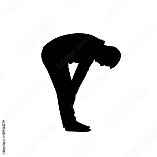 Silhouette of a person bending over with hands on knees.