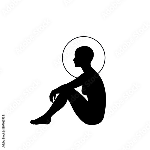 Silhouette of a seated person with a halo, contemplating in solitude, peaceful and serene.