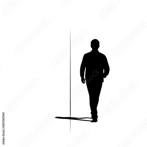 Silhouette of a man walking next to a thin vertical line casting a shadow.