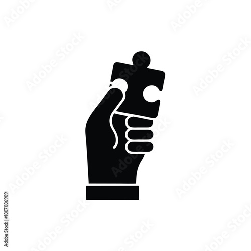 Hand Holding Puzzle Piece: Integration, Solution, and Completeness Concept [Black and White Icon]                                                     