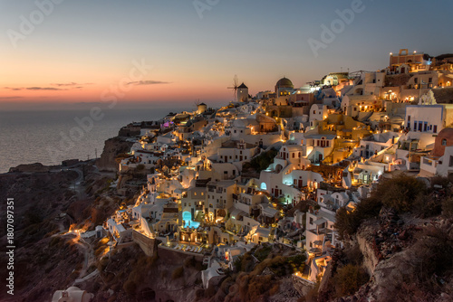 Sunset over the cliffside town of Oia, Santorini, Cyclades, Greece