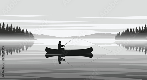 Monochrome landscape of a lone fisherman fly fishing from a canoe on a calm, misty lake with his reflection in the still water.