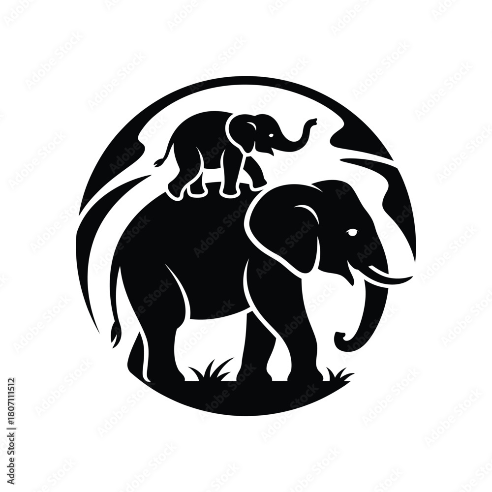 Fototapeta premium Silhouette of a mother elephant with a baby elephant on her back