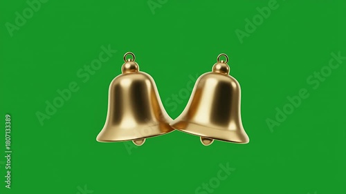 Two golden bells ringing in unison on an isolated green screen background for chroma keying