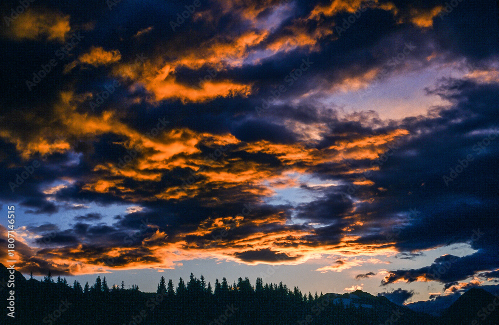 Fototapeta premium Dark clouds during sunset