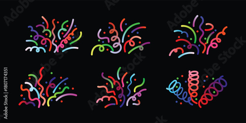 Colorful confetti and streamers scattered on a black background for celebration