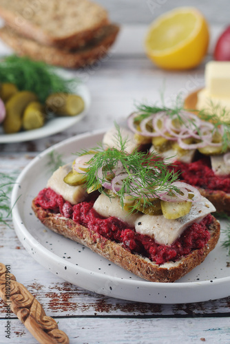 Scandinavian sandwiches with herring and beetroot