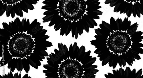 A repeating pattern of black and white floral designs, resembling stylized sunflowers, creates a visually striking and graphic wallpaper.
