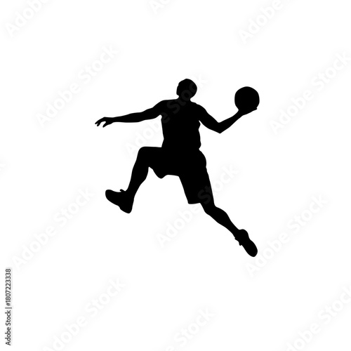 Silhouette of a basketball player jumping with ball isolated on white background