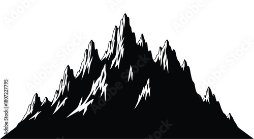 Dramatic silhouette of jagged, imposing mountain peaks against a white background.