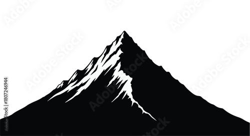 Majestic snow-capped mountain peak rising against a clear sky, symbolizing achievement and ambition.