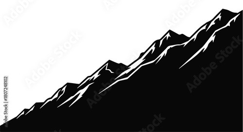 Dramatic black and white silhouette of rugged mountain peaks against a white sky