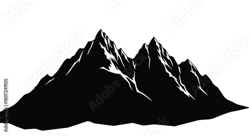 Majestic mountain peaks silhouetted against a bright sky, symbolizing adventure and achievement.