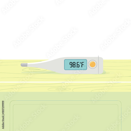 Digital thermometer displaying temperature on wooden counter surface  