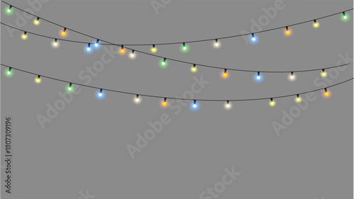 Vibrant glowing hanging lights in red, yellow, and green colors creating a warm festive atmosphere against a dark backdrop