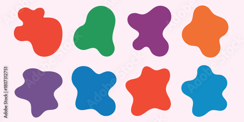 Abstract organic blob shapes pattern in various vibrant colors on a light pink background