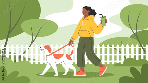 A person walks their dog on a leash in a park, enjoying a drink.