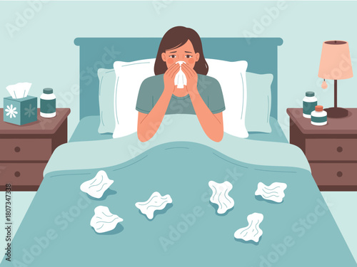 A sick person is blowing their nose in bed with tissues scattered around them.