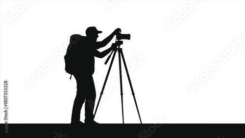 Silhouette of Male Travel Vlogger Adjusting Professional Camera on Tripod – Adventure Content Creator with Large Backpack Preparing to Film Travel Adventure Footage Isolated on White Background