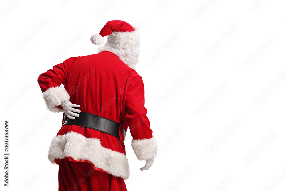 Fototapeta premium Rear view shot of Santa Claus with backpain