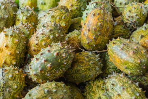 Ripe Yellow African Horned Melon(Cucumis metuliferus) displayed at a local Kenyan market Stall
