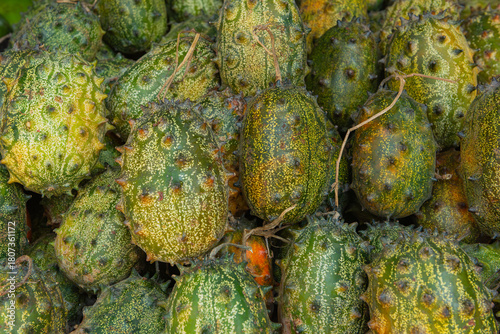 Ripe Yellow African Horned Melon(Cucumis metuliferus) displayed at a local Kenyan market Stall
