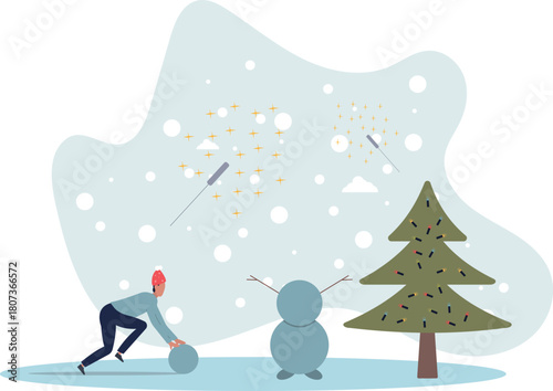 The boy rolls a snowball and makes a snowman.