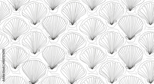 Elegant seamless art deco pattern with stylized black and white seashell fan shapes.