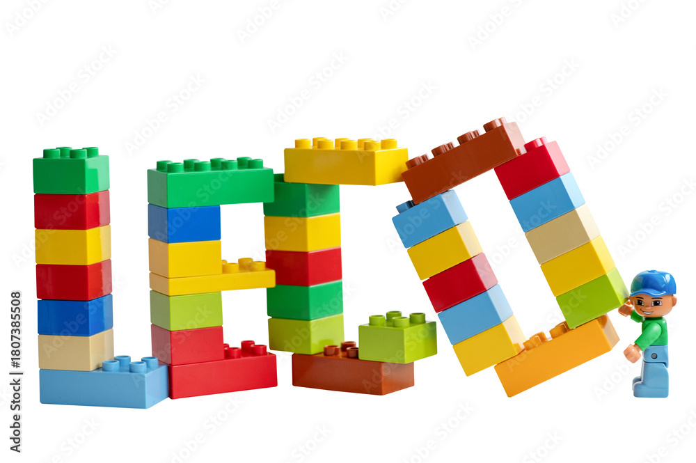 Naklejka premium A Lego minifigure holds the letter O in front of the word 