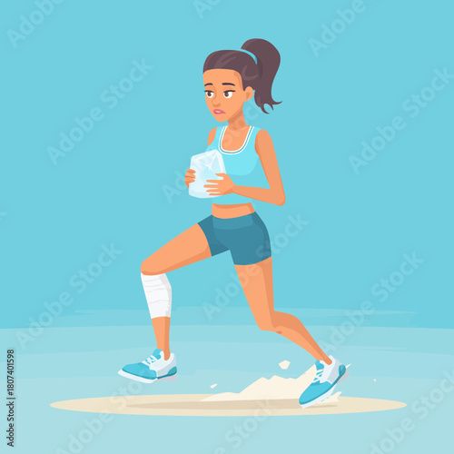 Woman injured while running holding an ice pack outdoors