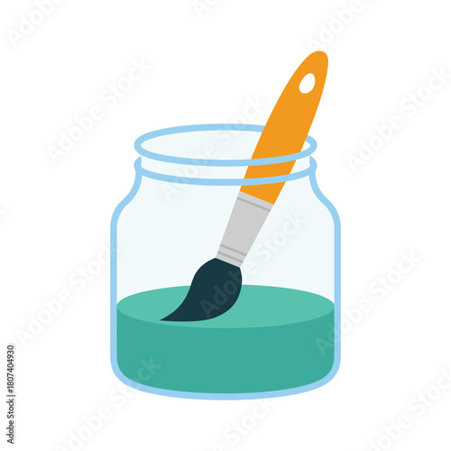 Paintbrush soaking in a jar of turquoise water for art projects
