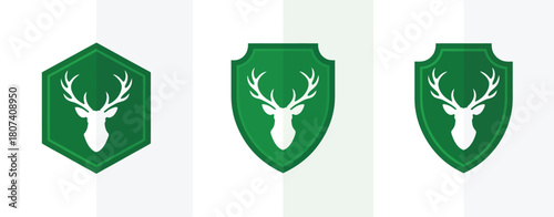 Three green shields with white deer heads and antlers