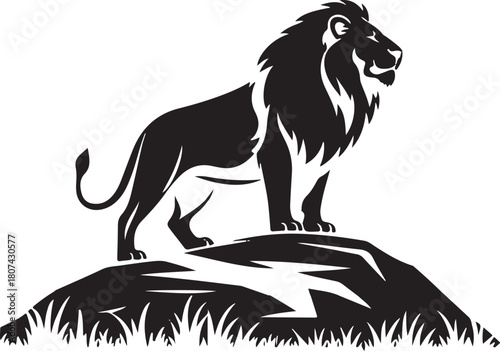 Black silhouette of a lion standing on a rocky outcrop with grass animal king