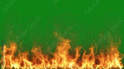 Realistic fire flames burning on a vibrant green screen background, ideal for visual effects.