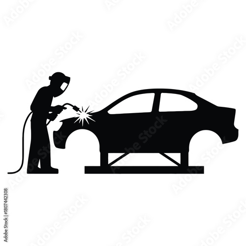 Silhouette of a welder working on a car chassis isolated on white background, sparks flying, wearing protective gear