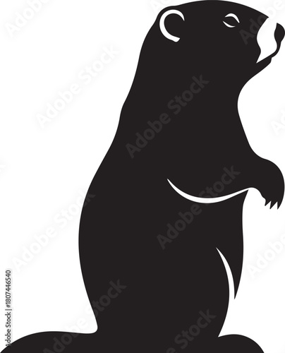 Silhouette of a groundhog standing tall on its hind legs animal wildlife silhouette