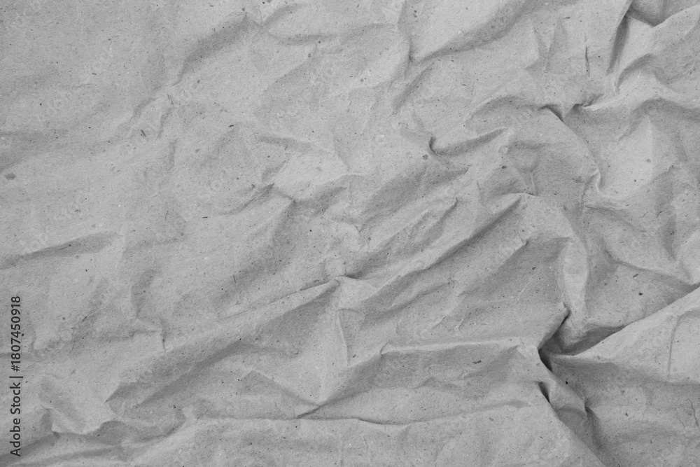 Naklejka premium Abstract wrinkled light gray crumpled paper texture background