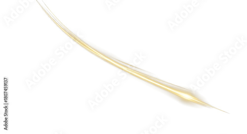 A golden light streak diagonally across a black background creating a sense of motion and speed