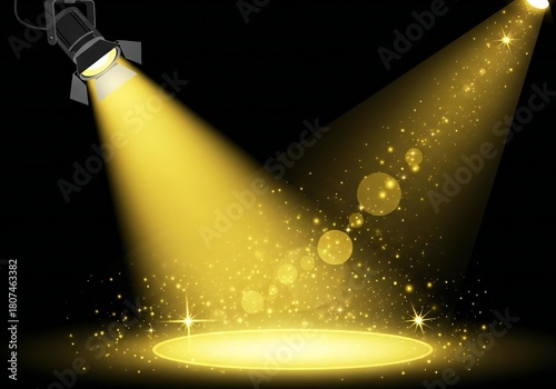 Golden spotlight illuminates stage with sparkling light effects and dust particles