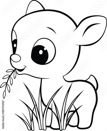 Cute baby deer eating grass