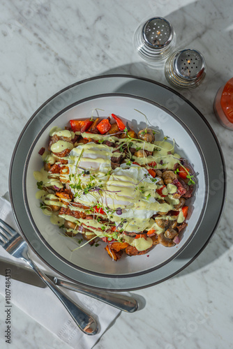 corned beef hash with eggs in hard light