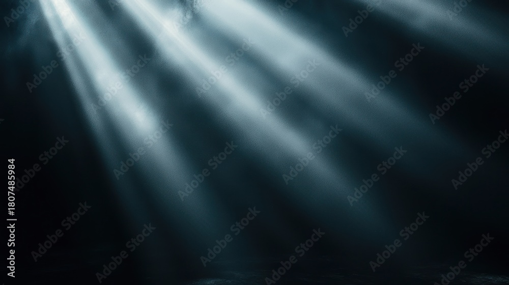 Naklejka premium Light shafts pierce smoky dark space, creating an atmospheric effect