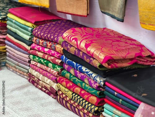 Handmade Indian silk sari / saree with golden details, woman wear on festival, ceremony and weddings, expensive sarees are famous for their gold and silver zari, brocade. Incredible India.