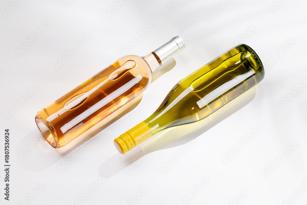Fototapeta premium Different wine bottles on white background