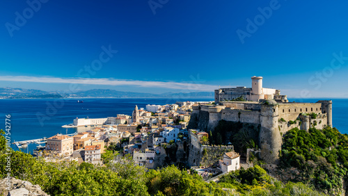 Fototapeta Naklejka Na Ścianę i Meble -  Gaeta, Latina, Lazio, Italy. A splendid view of the city from the top of Monte Orlando. The imposing Angevin-Aragonese castle dominates the ancient village overlooking the sea from the clifftop.