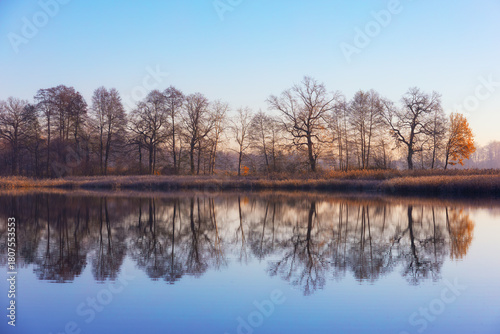 Serene Autumn Lake Reflection at Golden Hour (Poland), nature background or wallpaper